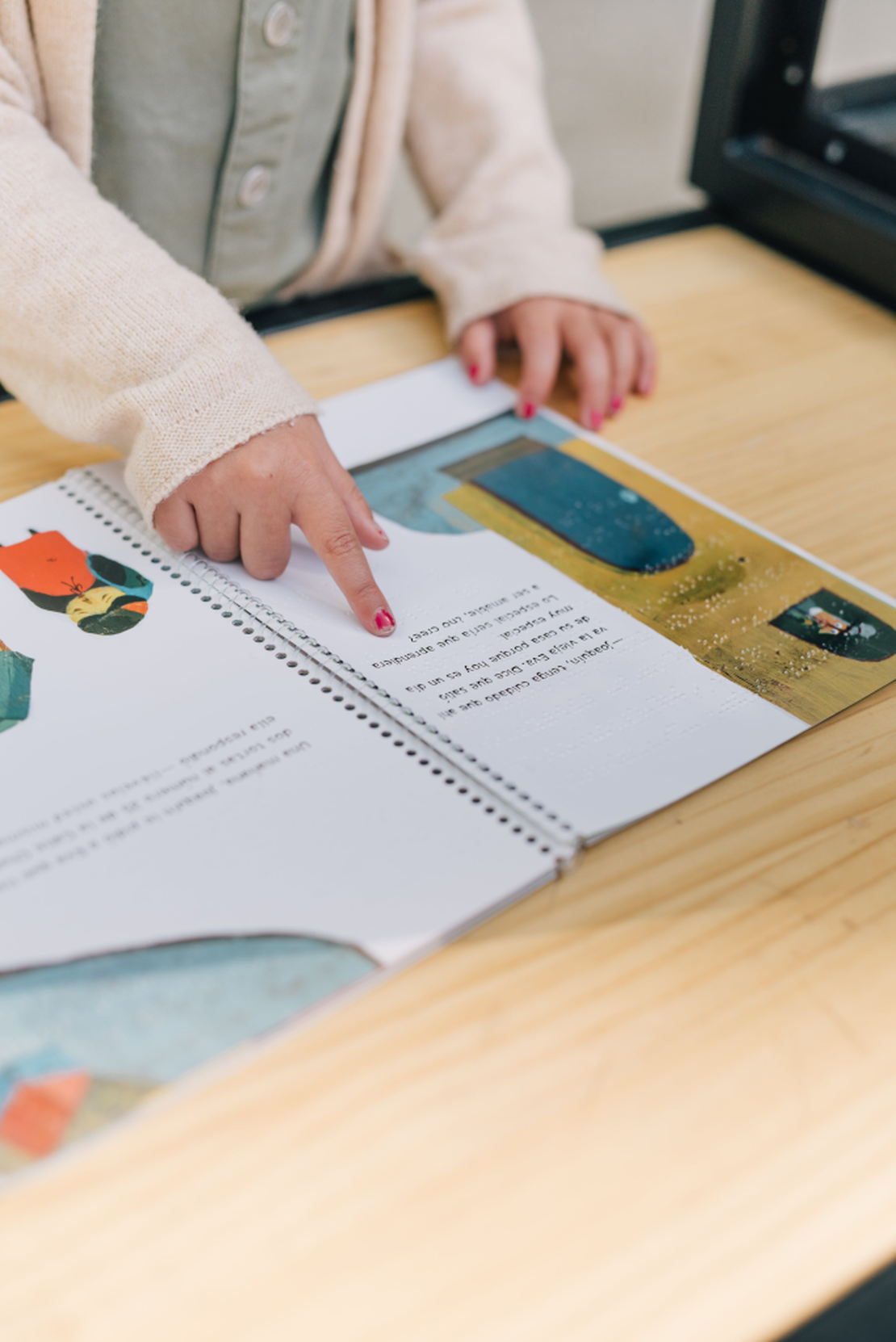 Picture of a child reading a book